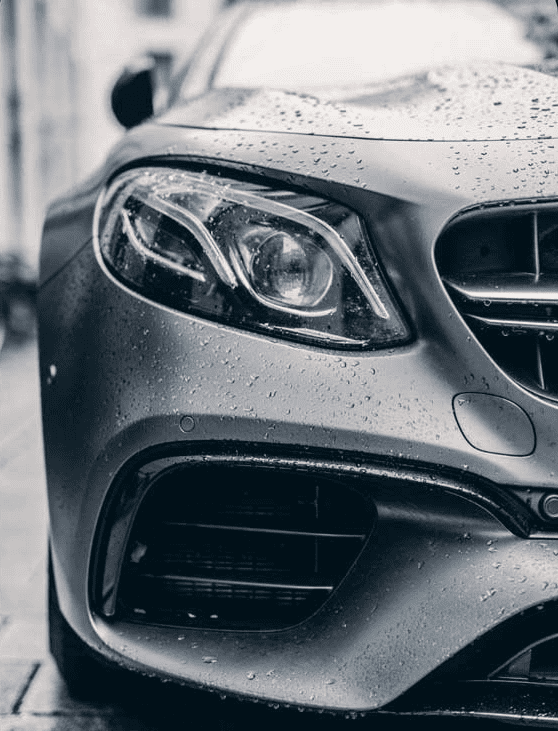 Bumper Display of A Red Metallic Car